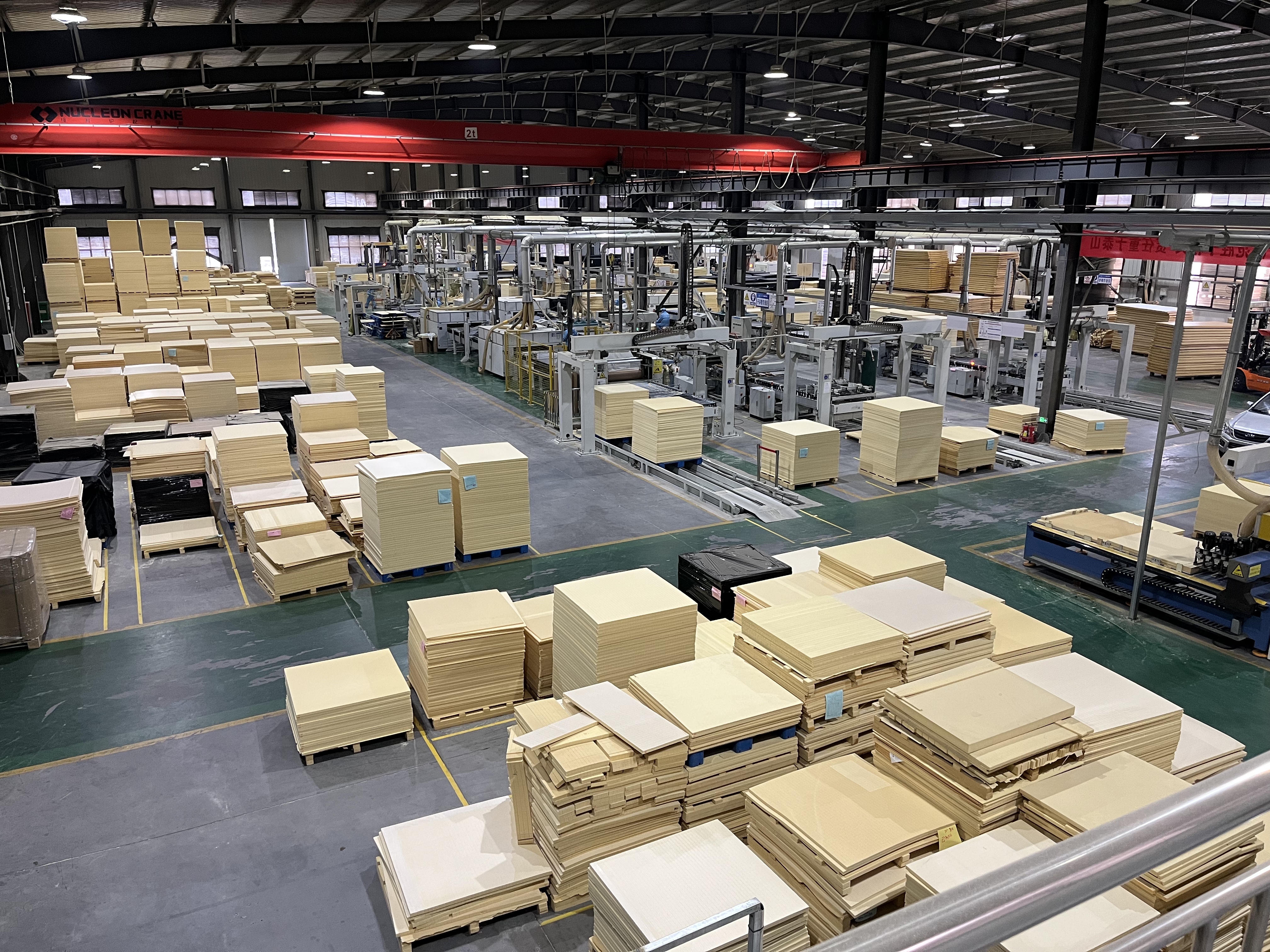ISO-certified factory producing PVC foam boards with automated CNC machines and 3-stage quality inspection