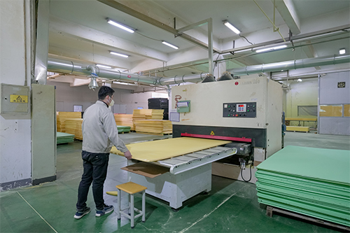 Close-up of UNION P60 PVC foam extrusion manufacturing process